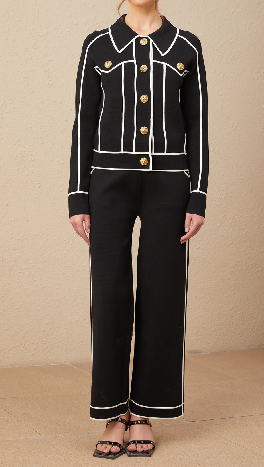 SEVEN-BUTTON BLACK PIPED-TRIM JACKET