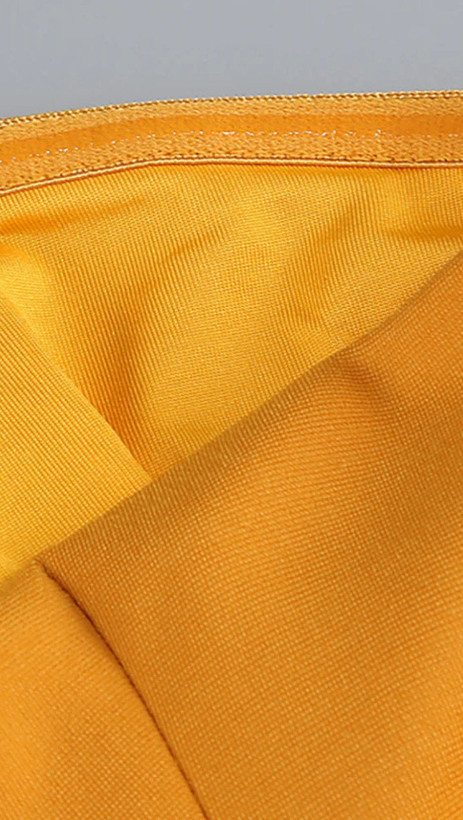 NODIN STRAPLESS DOT MESH MAXI DRESS IN ORANGE