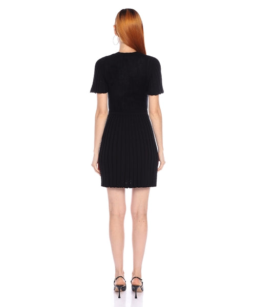 SHEILA SCHWARZES MINIKLEID AUS STRICK MIT RÜSCHEN