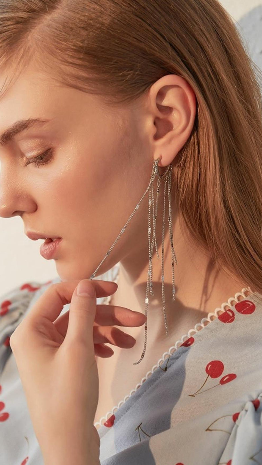 GOLD HEART-SHAPED TASSEL EARRINGS