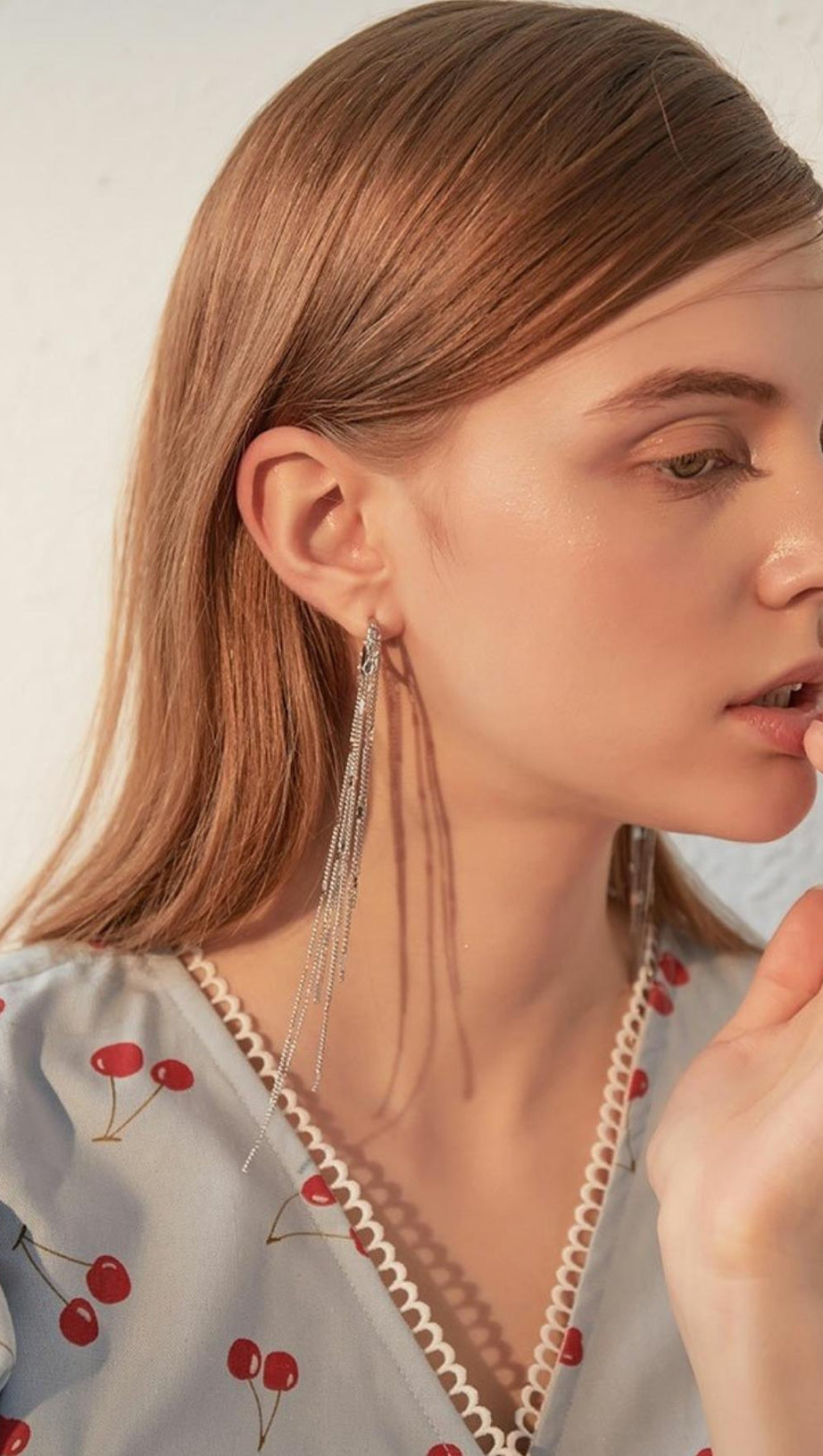 GOLD HEART-SHAPED TASSEL EARRINGS