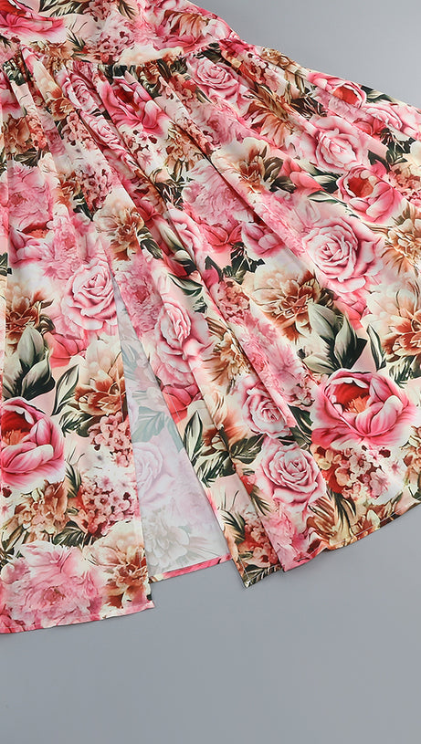 Rosa bedrucktes Midikleid mit offenem Rückenschlitz und ausgehöhlter Vorderseite