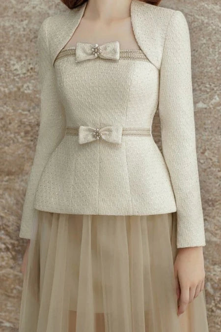 Tweedjacke und Tüllrock in Aprikose