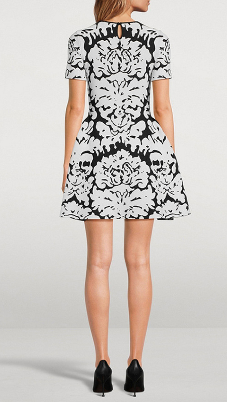 MINIKLEID AUS STRETCH-STRICK MIT BLUMENMUSTER