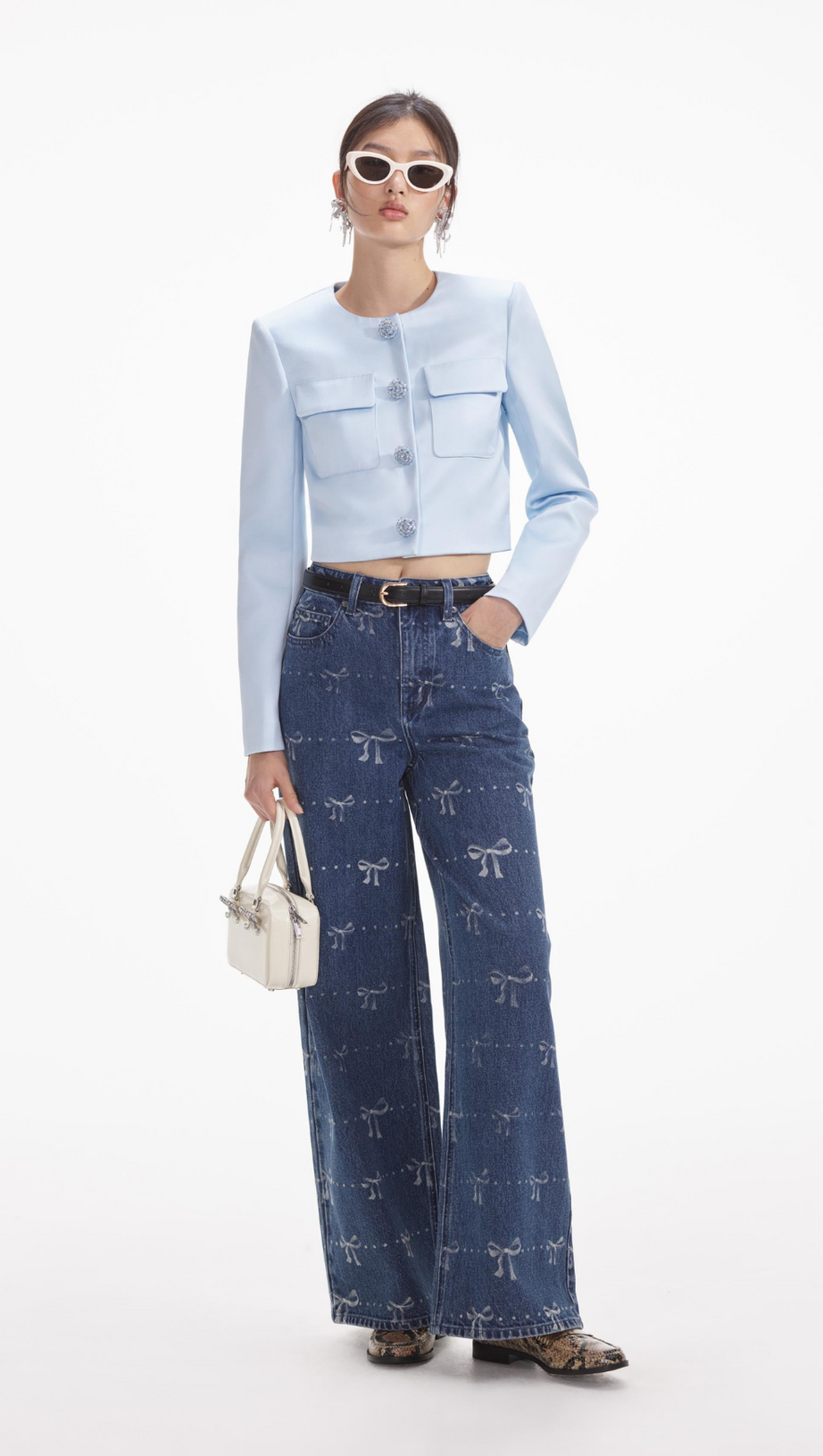 JEANS CON STAMPA A FIOCCO