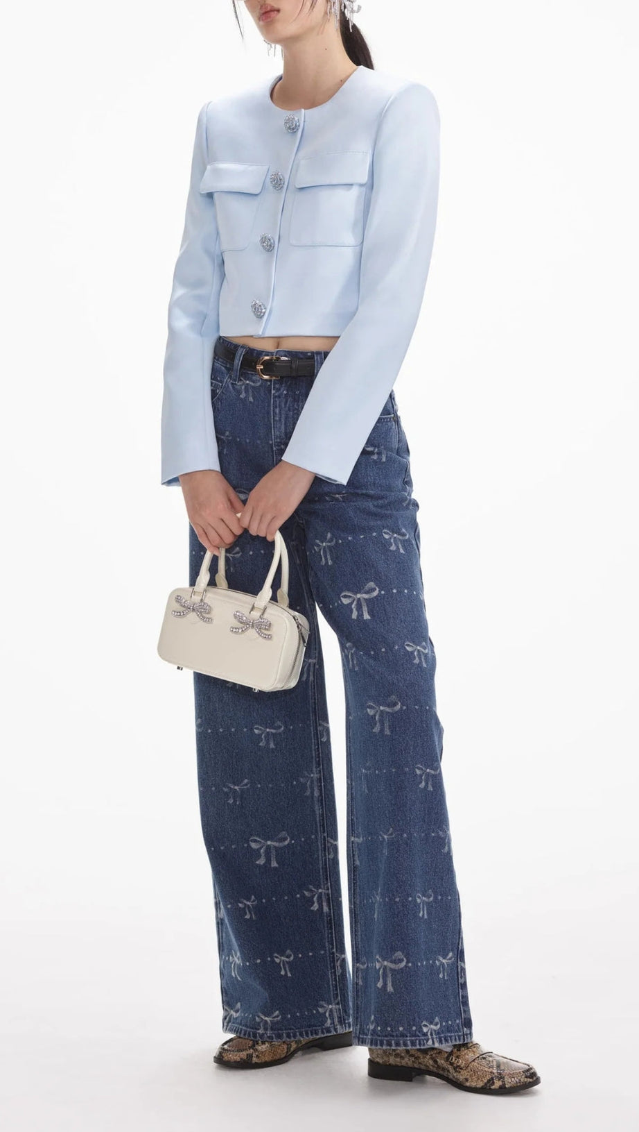 JEANS CON STAMPA A FIOCCO