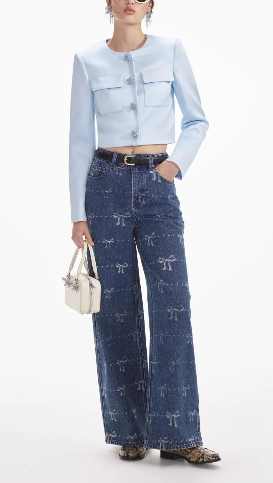 JEANS CON STAMPA A FIOCCO