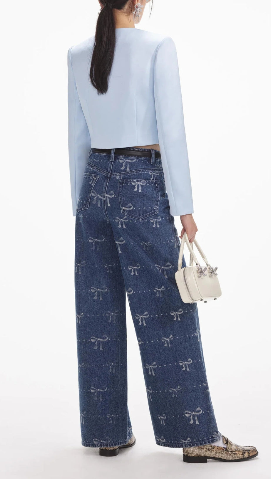 JEANS CON STAMPA A FIOCCO