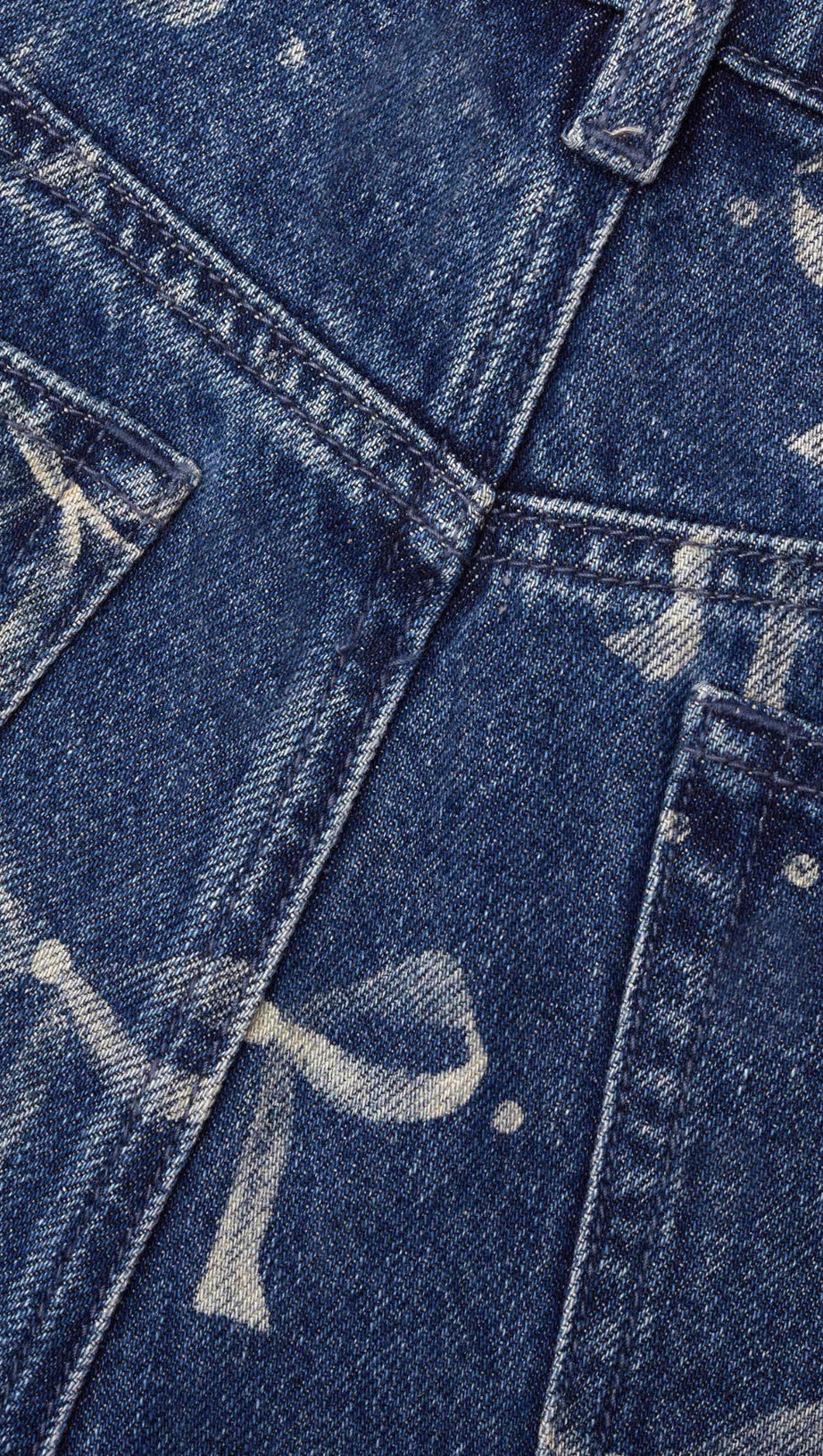 JEANS CON STAMPA A FIOCCO