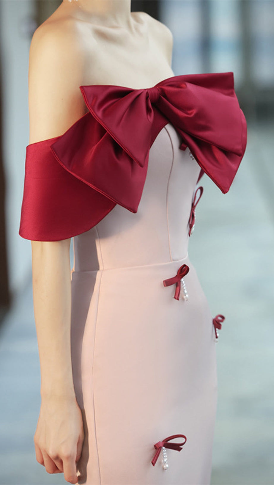 FAUX PEARL BOW MIDI DRESS IN PALE PINK