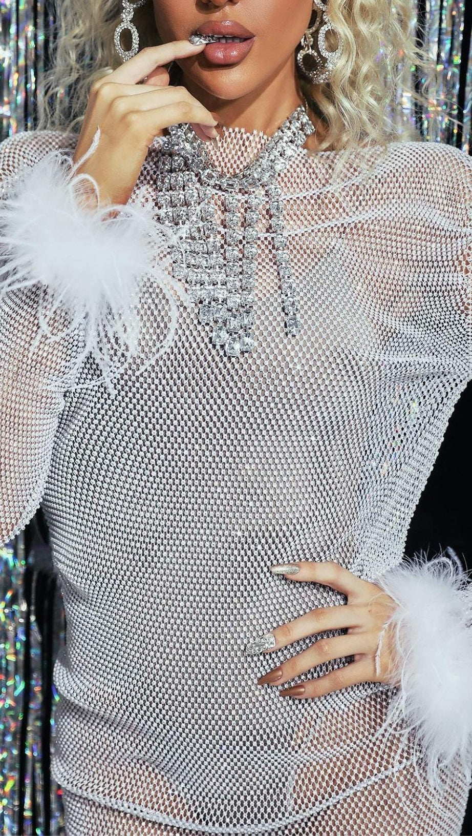 MINIKLEID AUS MESH MIT FEDERN