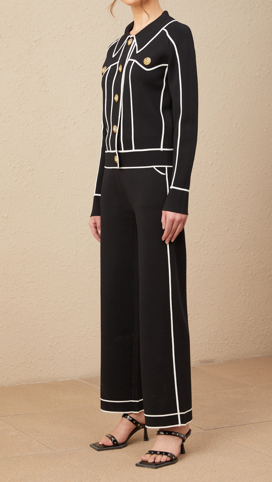 SEVEN-BUTTON BLACK PIPED-TRIM JACKET