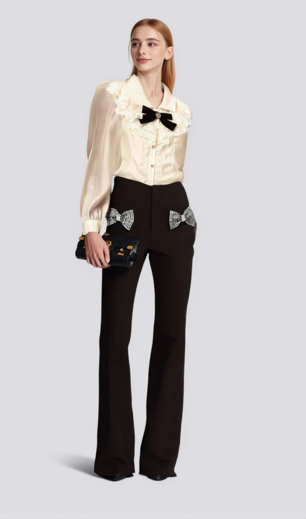 GELSOMINA BOW-EMBELLISHED FLARED TROUSERS
