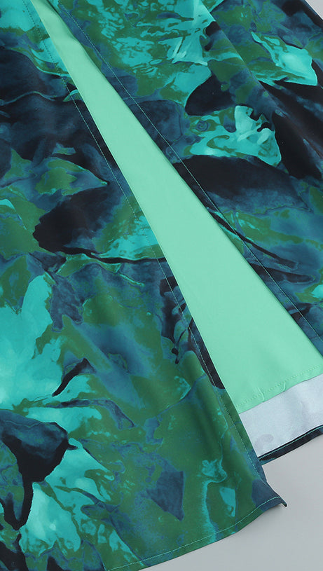 ABITO CON APERTURA SUL PETTO E ABITO MIDI VERDE