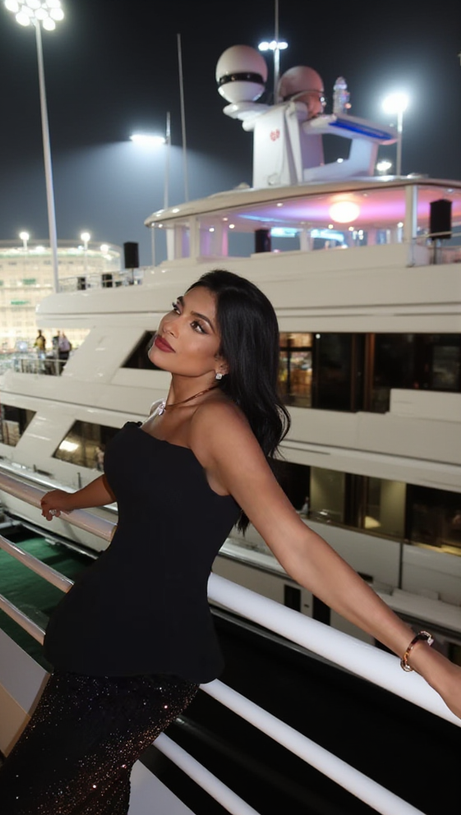 BLACK TOP AND SEQUINED FLOOR-LENGTH SKIRT SUIT