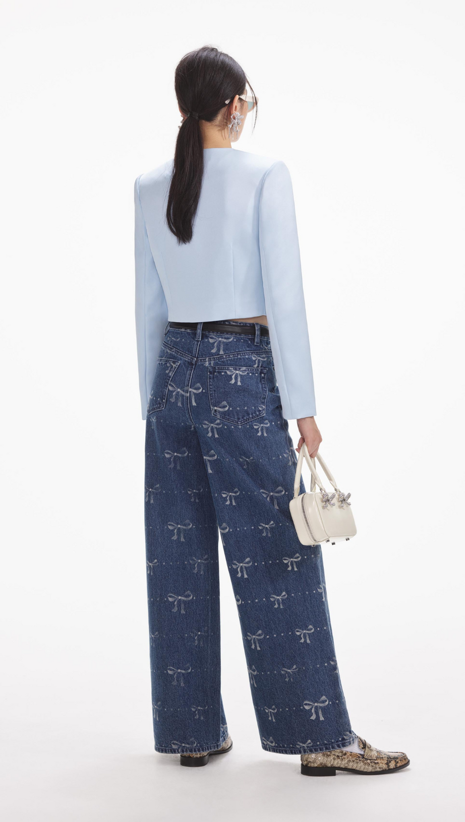 JEANS CON STAMPA A FIOCCO