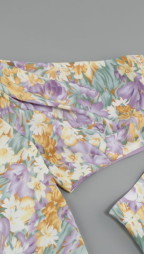 ABITO MIDI ASIMMETRICO CON MANICA MONOSPALLA E VOLANT