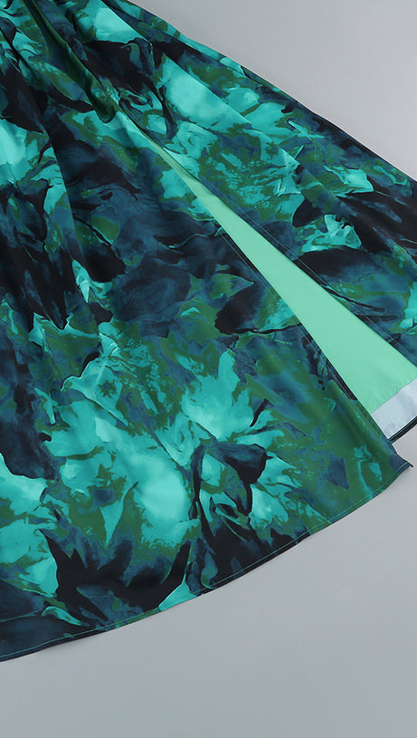 ABITO CON APERTURA SUL PETTO E ABITO MIDI VERDE