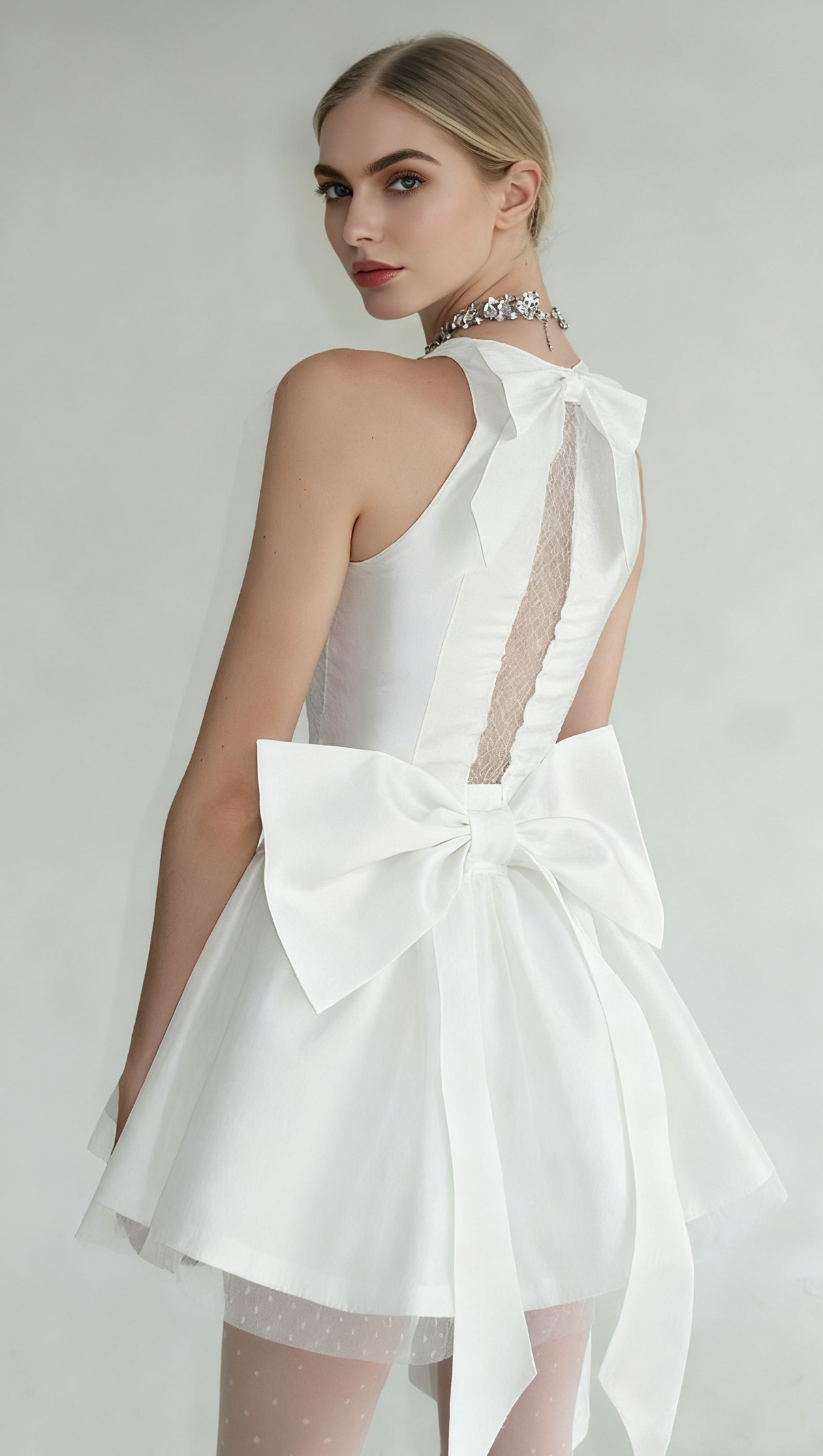 AIIZIE NORA OFF-SHOULDER BACKLESS LACE BOW MINI DRESS IN WHITE - product image