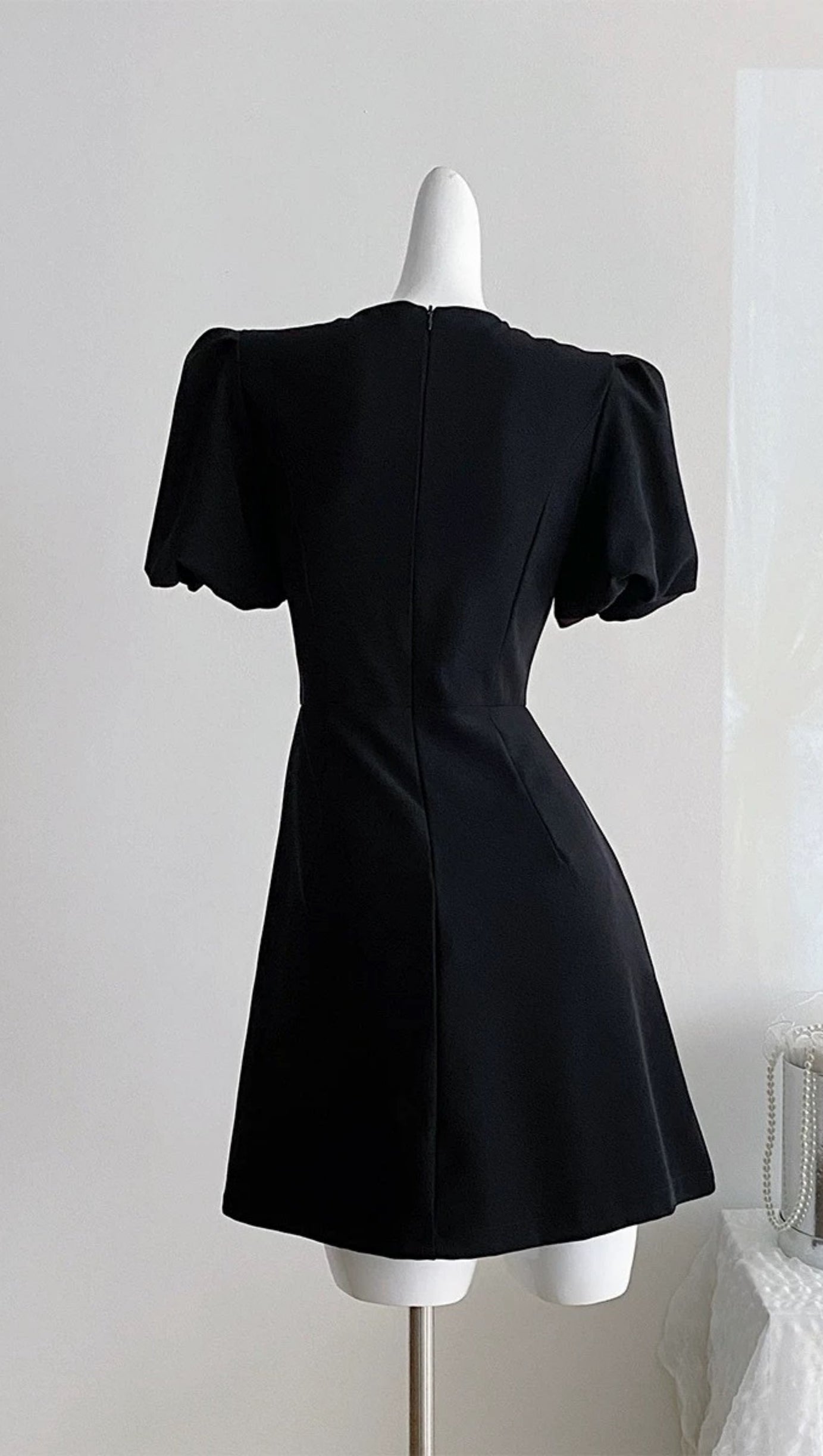 VANESSA BOW PUFF SLEEVE MINI DRESS IN BLACK