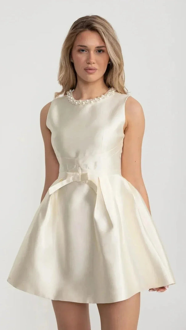 Elegant Fitted Dress With Pearl-Embellished Round Neckline And Bow Waistline Accent - Ivoire