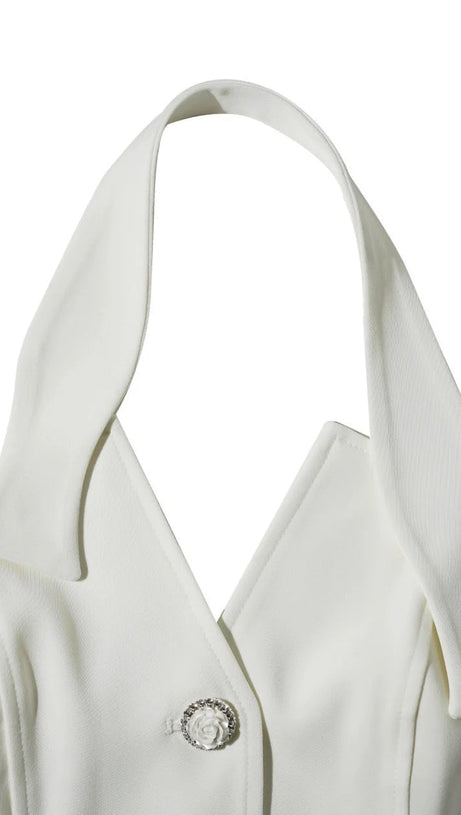 Completo con gilet con scollo all'americana e pantaloni decorati con fiori in avorio