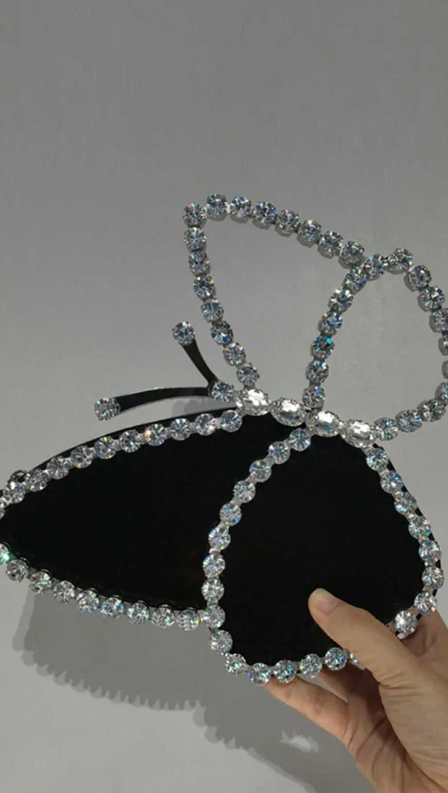 Bristyn Schwarze Clutch mit Schmetterlingsmotiv