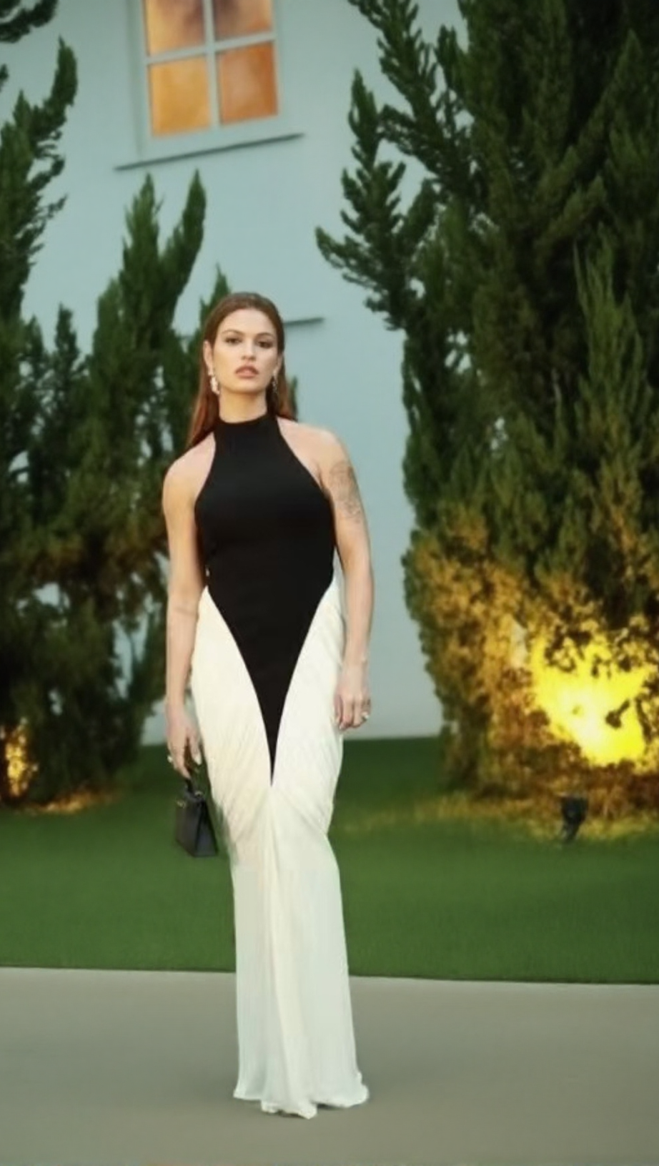 HIGH-CONTRAST HALTER MAXI GOWN WITH SCULPTURAL RUCHING