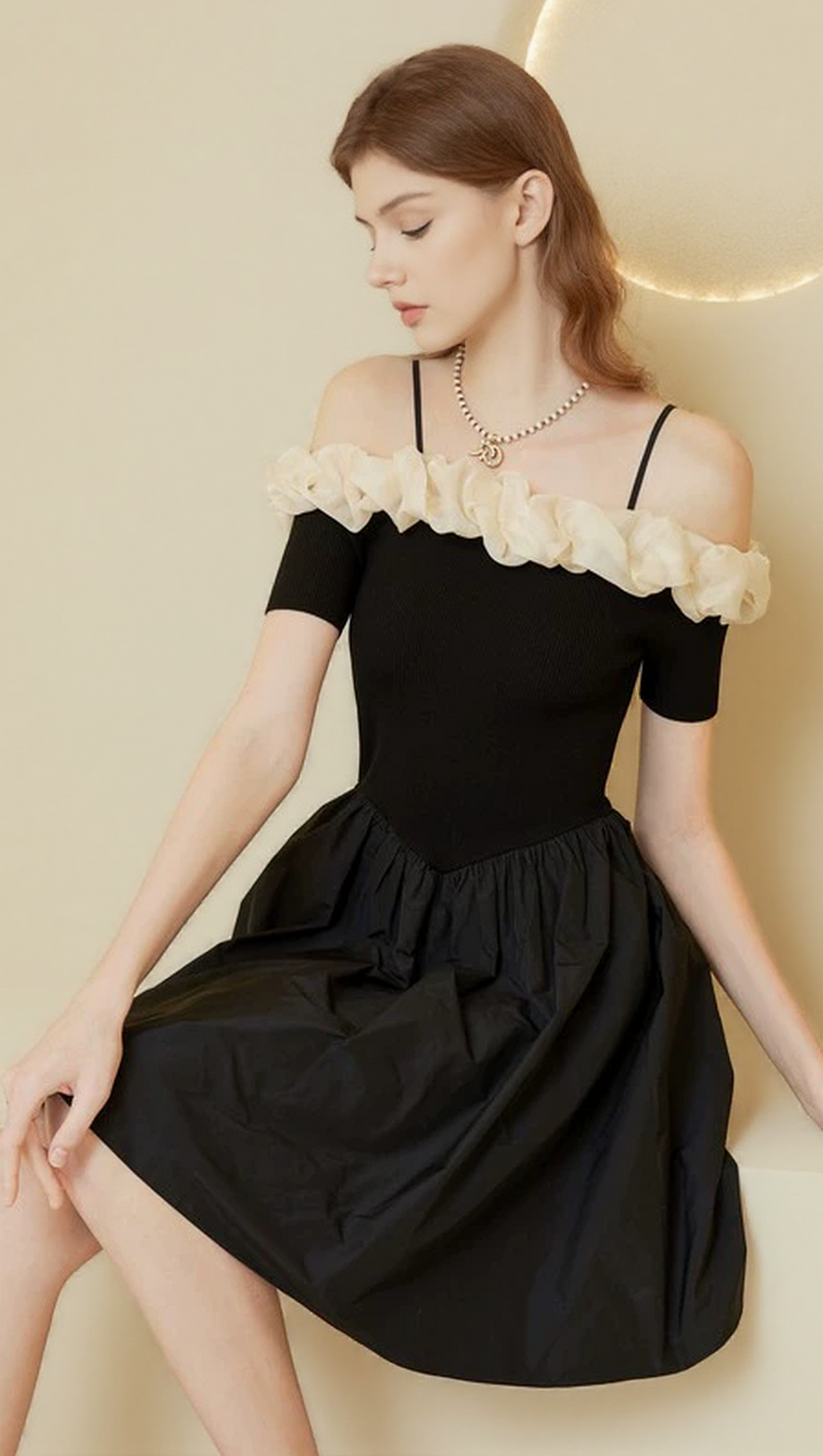 OFF-SHOULDER RUFFLE TRIM SUSPENDER MINI DRESS IN BLACK