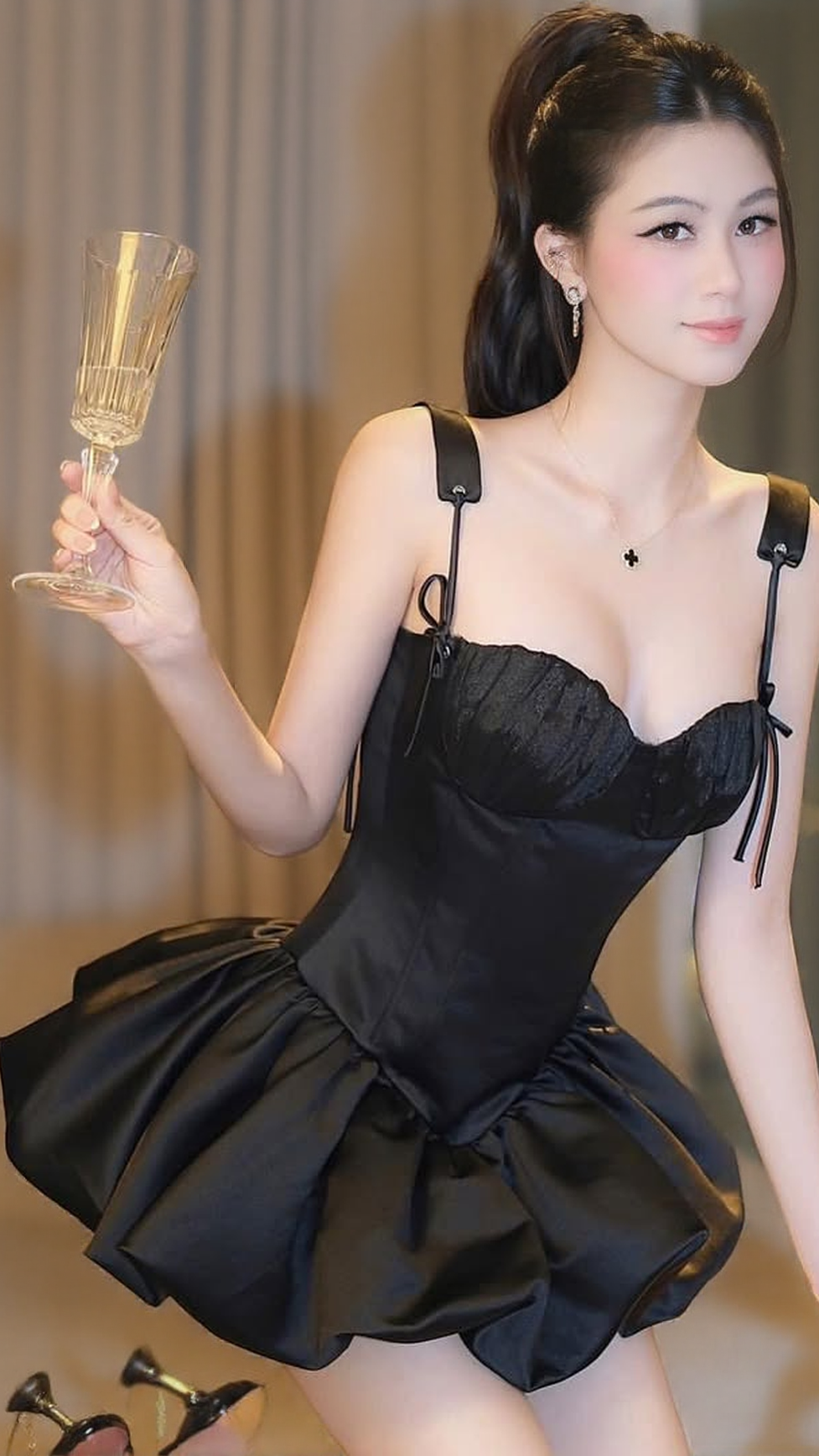 ELVIRA SUSPENDER BALLET MINI DRESS IN BLACK