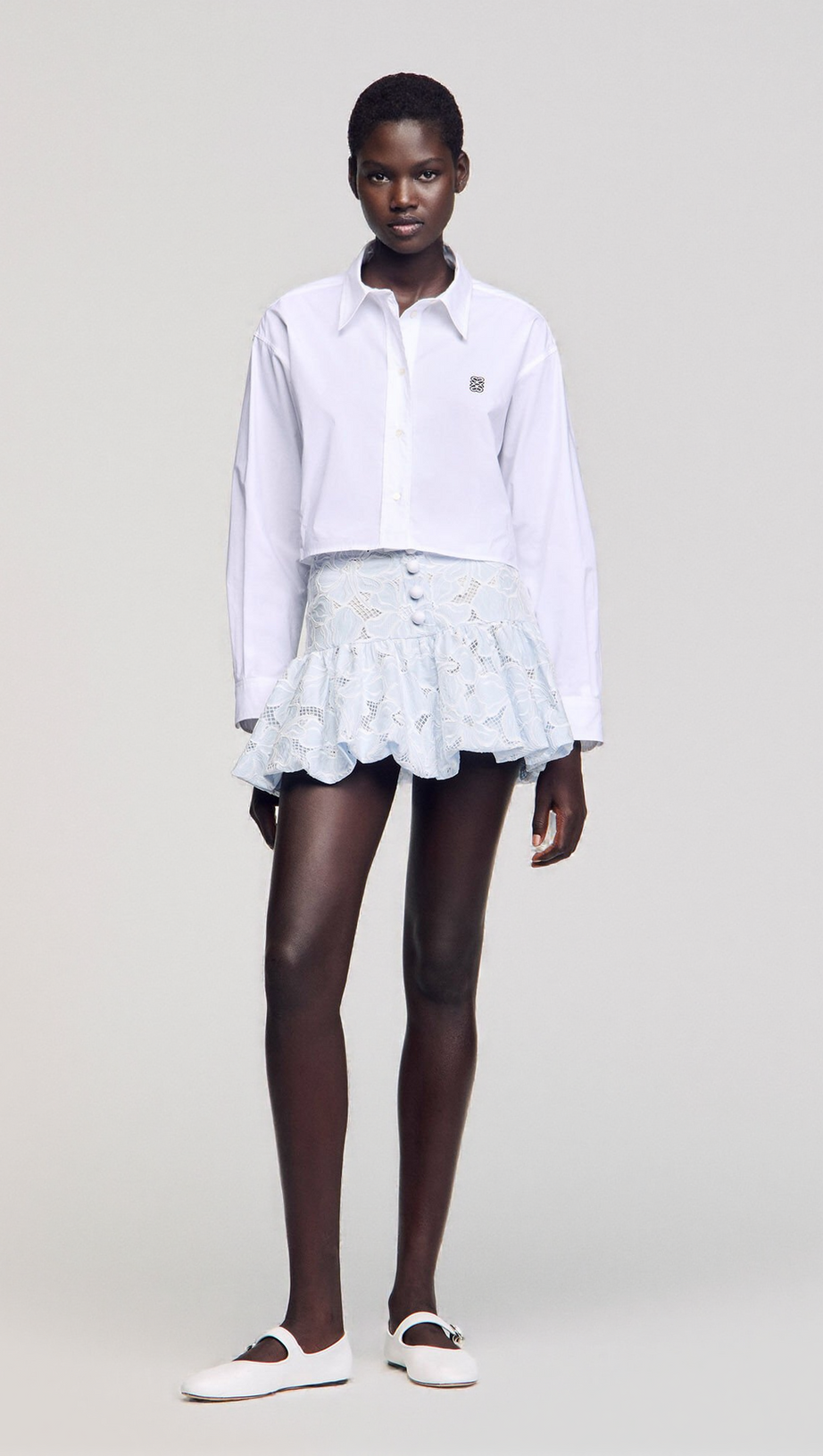 LACE FLOWER EMBROIDERY MINI SKIRT IN SKY BLUE