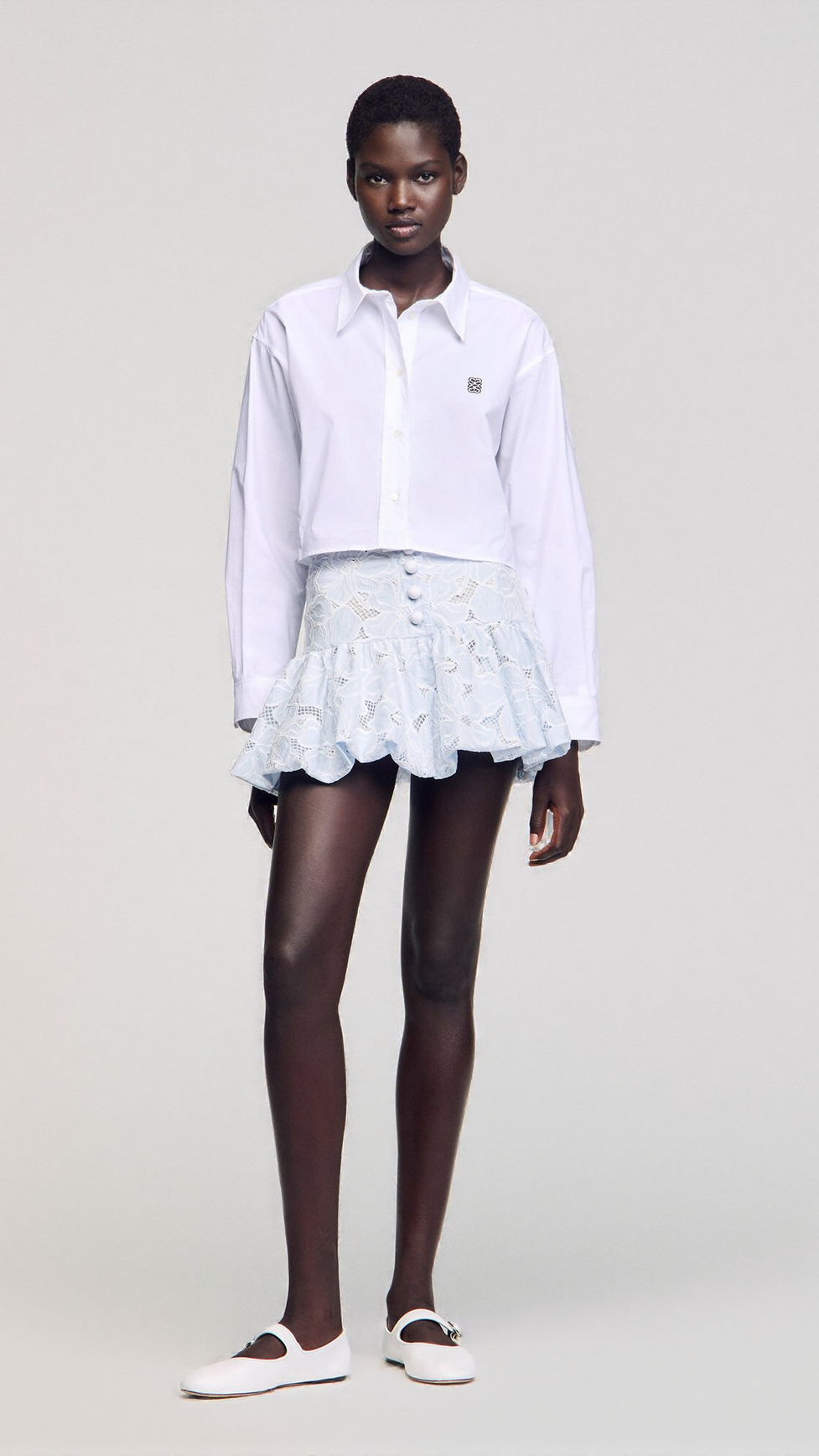 LACE FLOWER EMBROIDERY MINI SKIRT IN SKY BLUE