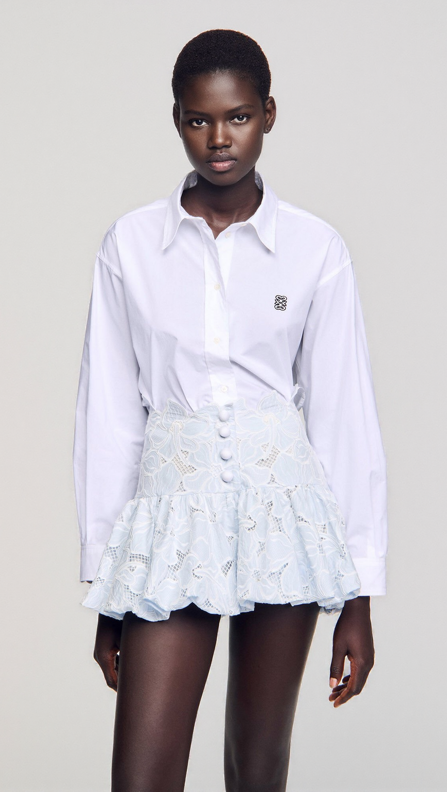 LACE FLOWER EMBROIDERY MINI SKIRT IN SKY BLUE