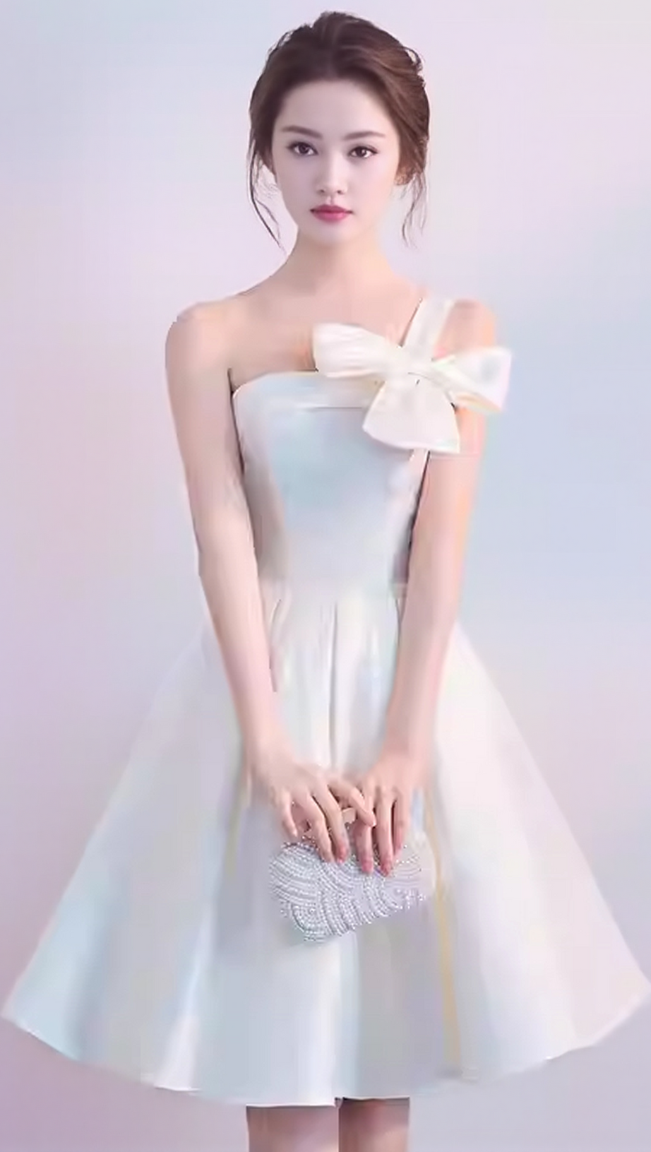 STRAPLESS BOW MINI DRESS IN WHITE