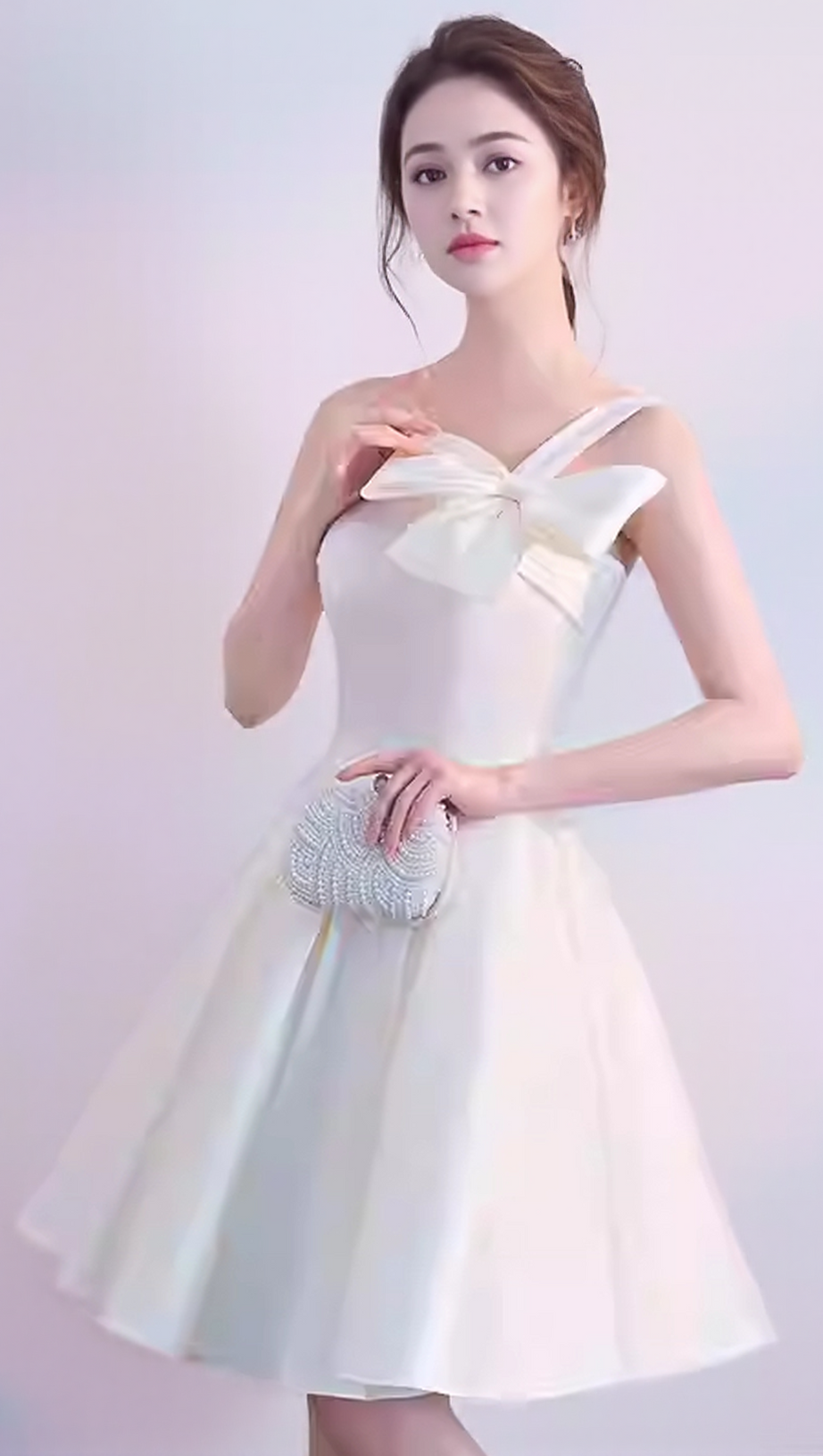 STRAPLESS BOW MINI DRESS IN WHITE