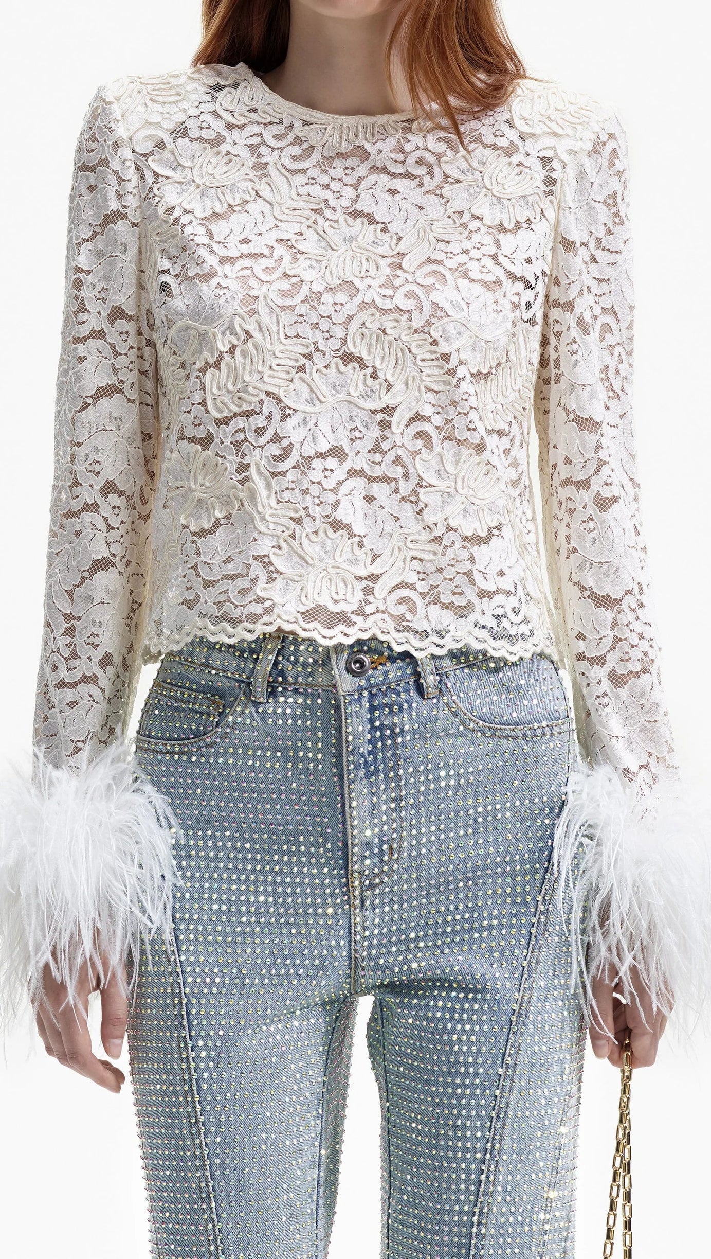 Cremefarbenes Top mit Cord-Spitze und Federn 