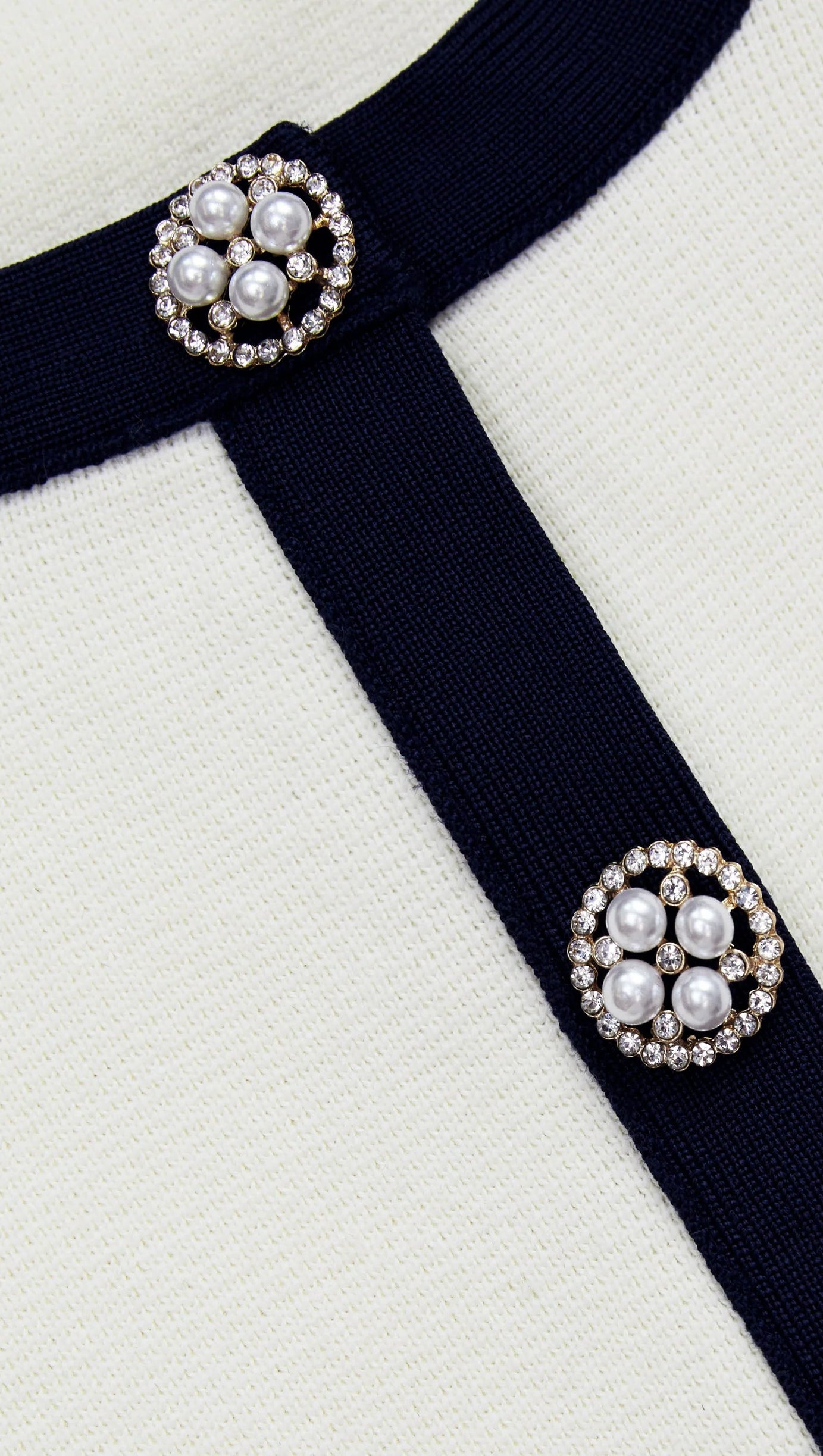 CREAM KNIT BOW MINI SKIRT