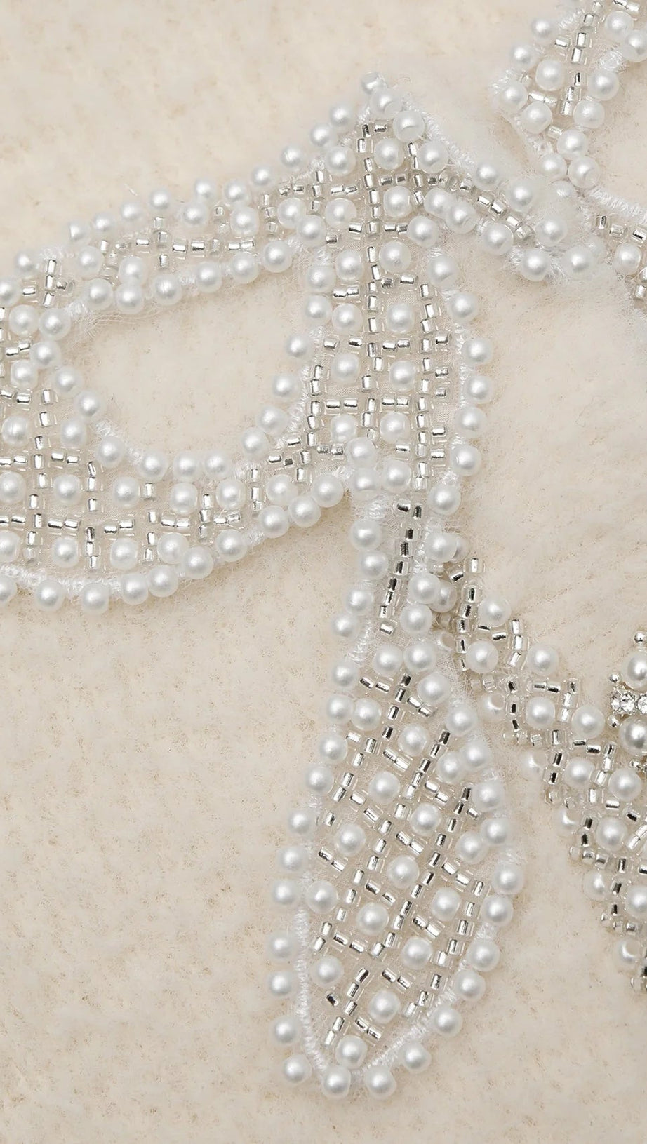 CARDIGAN IN MAGLIA MORBIDA CON FIOCCO COLOR CREMA 