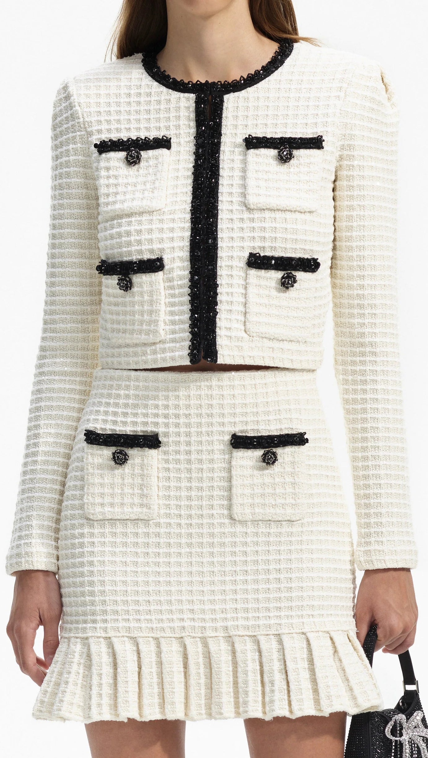 MINIGONNA IN MAGLIA CON TEXTURE CREMA 