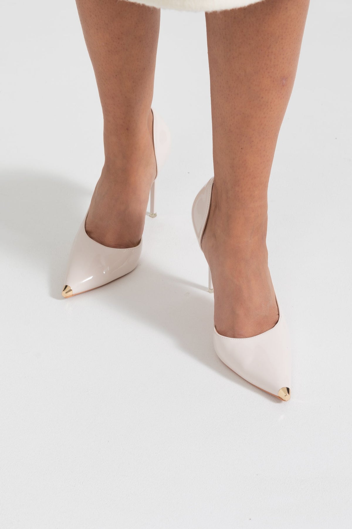 Light Beige Asymmetric Stiletto Pumps