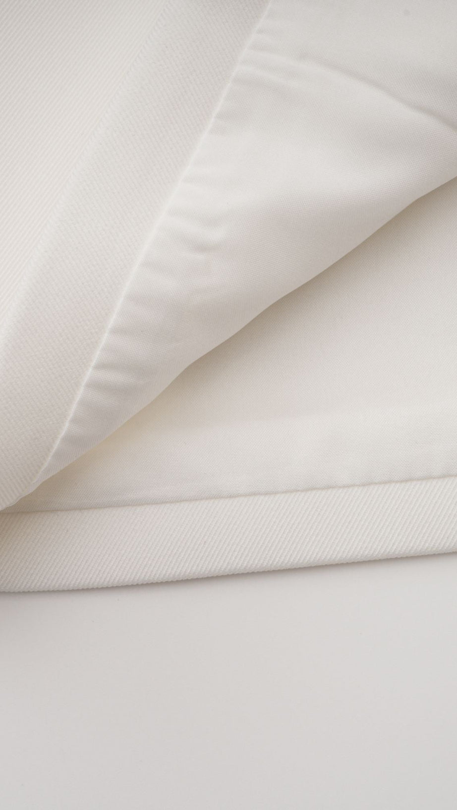 MINI ABITO BIANCO CON DETTAGLIO DI FIOCCO DI CRISTALLI