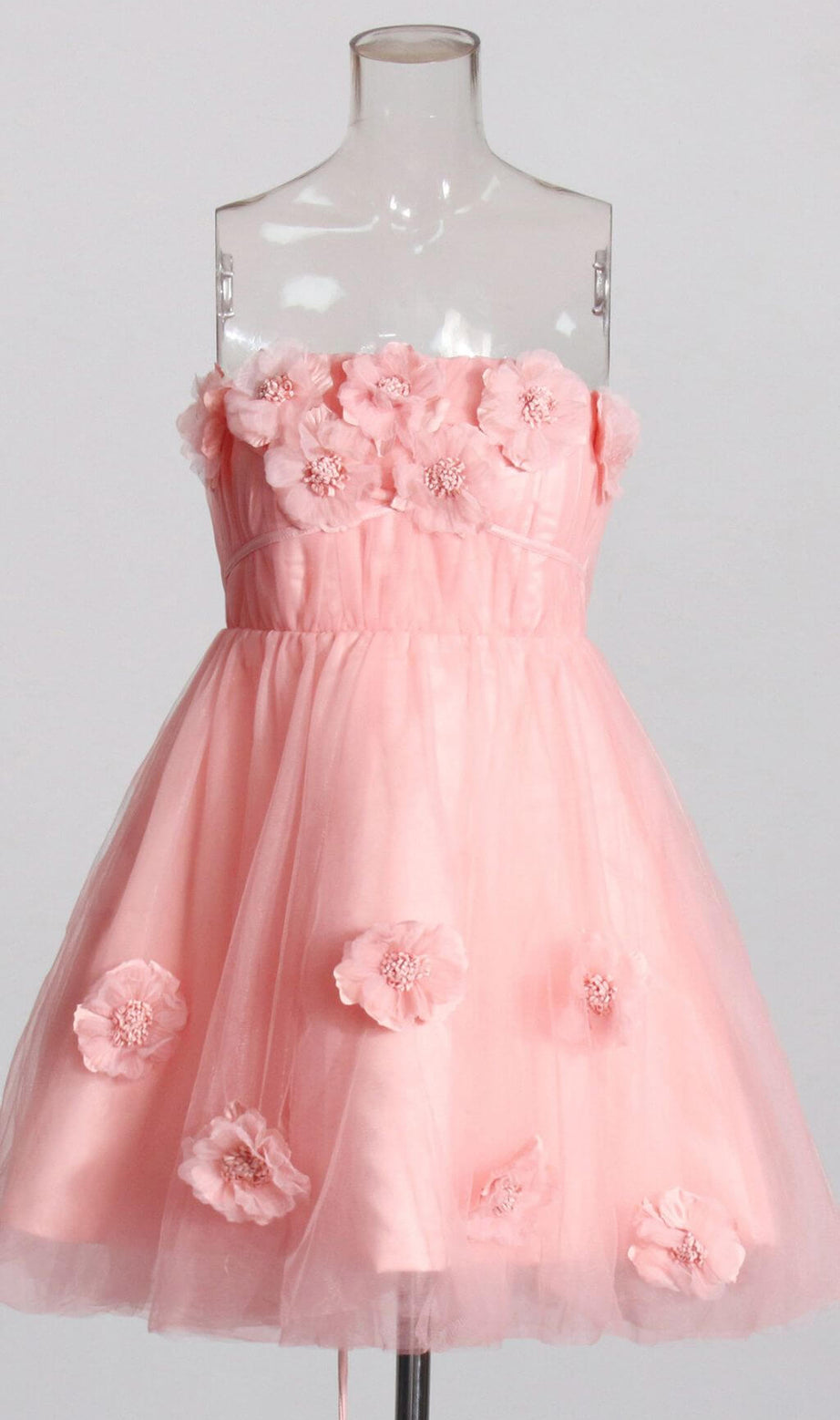 TRÄGERLOSES MINIKLEID MIT BLUMENAPPLIKATIONEN IN PINK