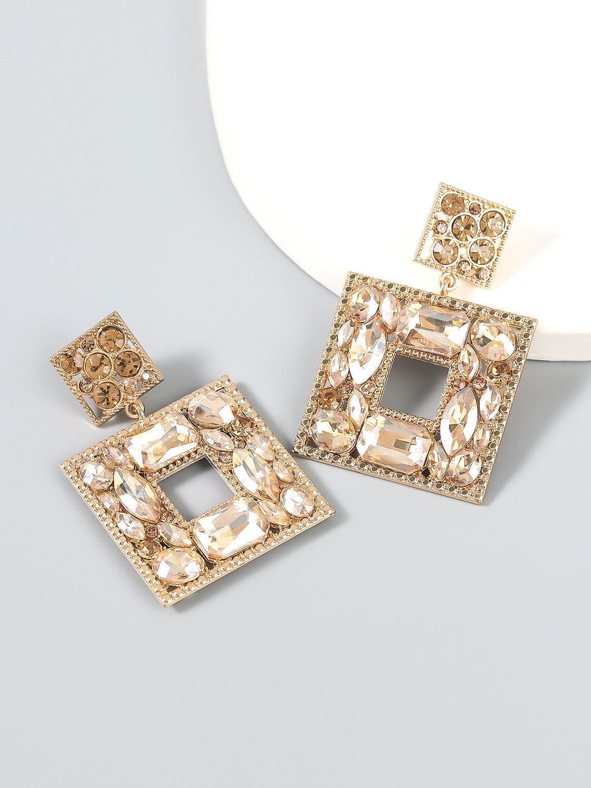 GEM DOOR KNOCKER STATEMENT EARRINGS