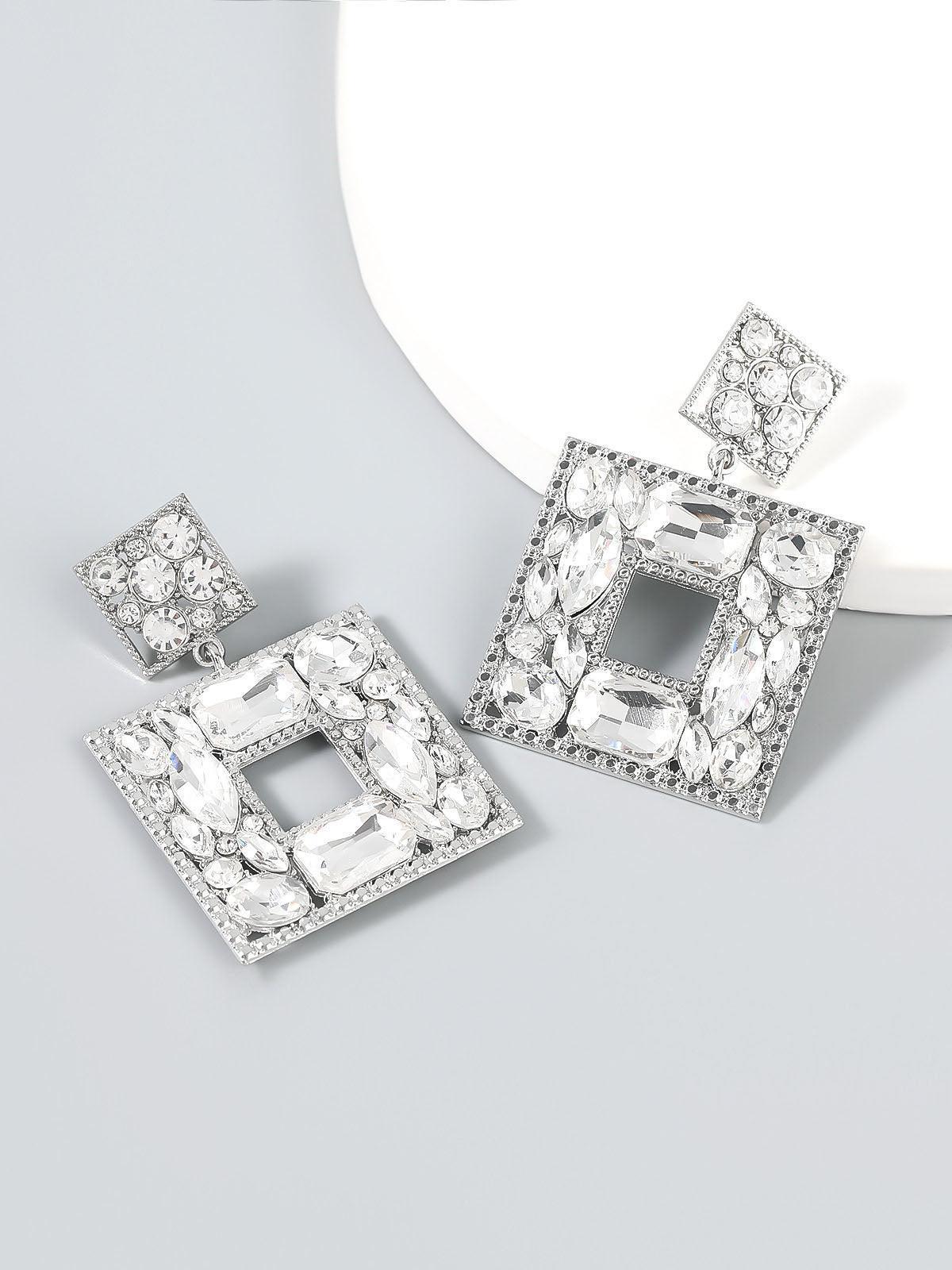 GEM DOOR KNOCKER STATEMENT EARRINGS