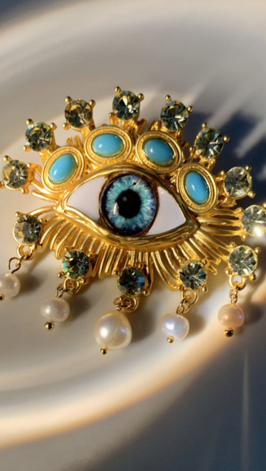 PEARL EMBELLIHSED EYE BROOCH