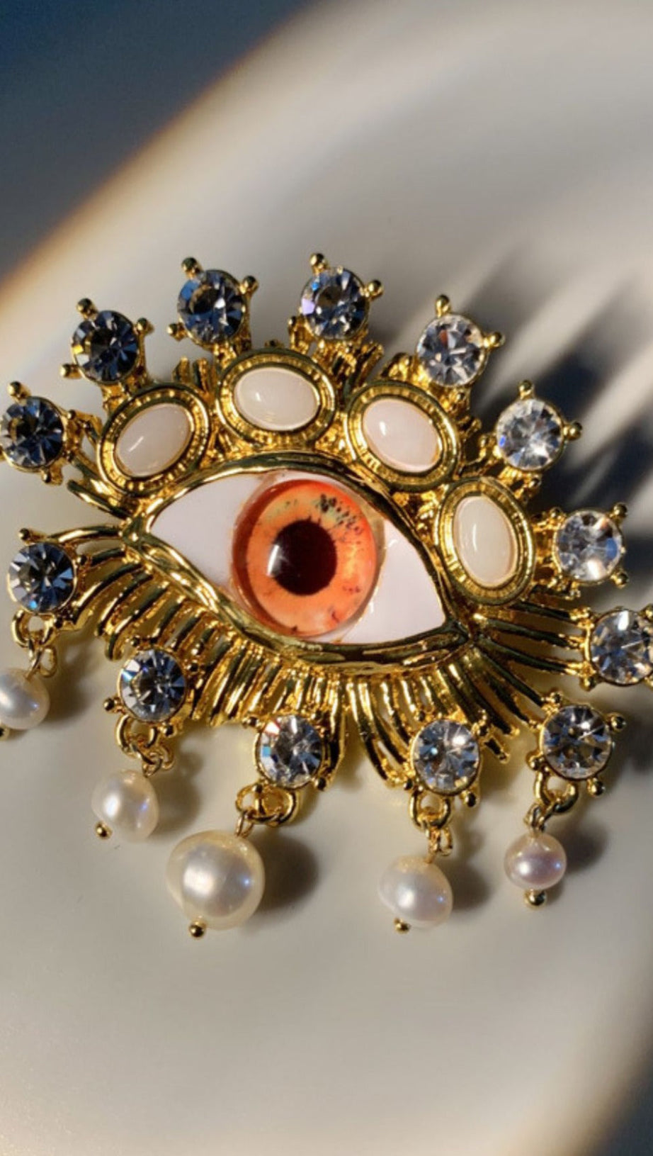 PEARL EMBELLIHSED EYE BROOCH