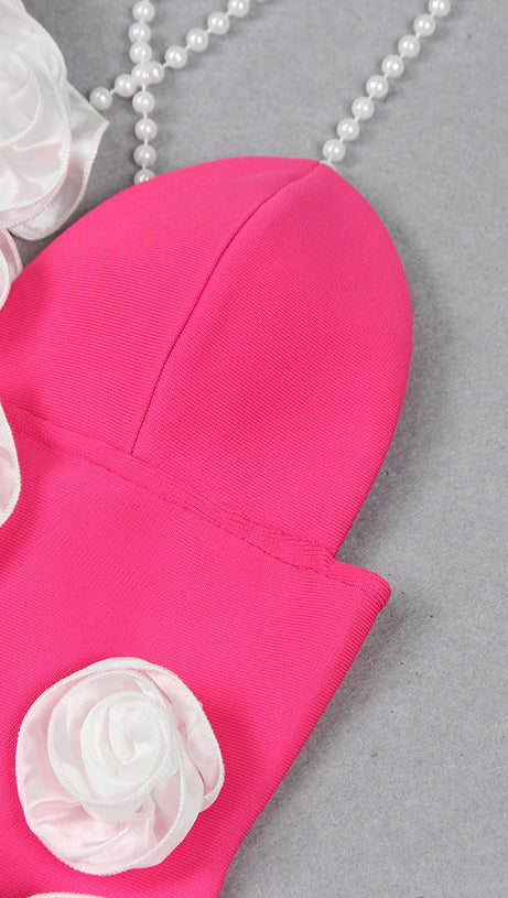 ABITO LUNGO CON SPALLINE DI PERLE E FIORI ROSA SHOCK