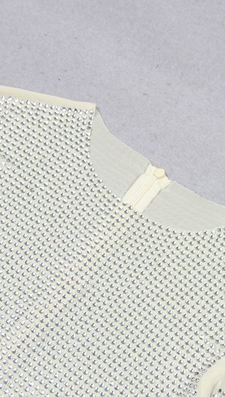 ABITO A MANICHE LUNGHE CON CRISTALLI IN AVORIO 