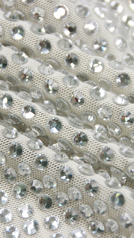 ABITO A MANICHE LUNGHE CON CRISTALLI IN AVORIO 