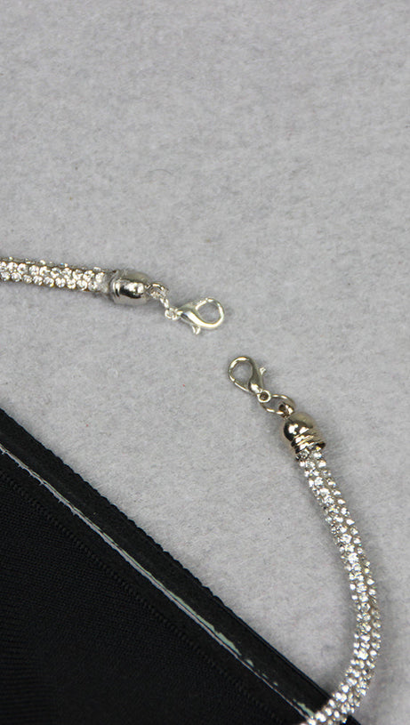 ABITO LUNGO CON SCOLLO A V E PIUME DI CRISTALLO IN NERO 